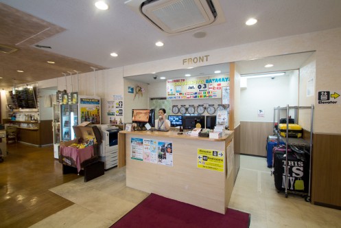 Reception desk of SAKURA HOTEL & CAFÉ HATAGAYA・Computer_2